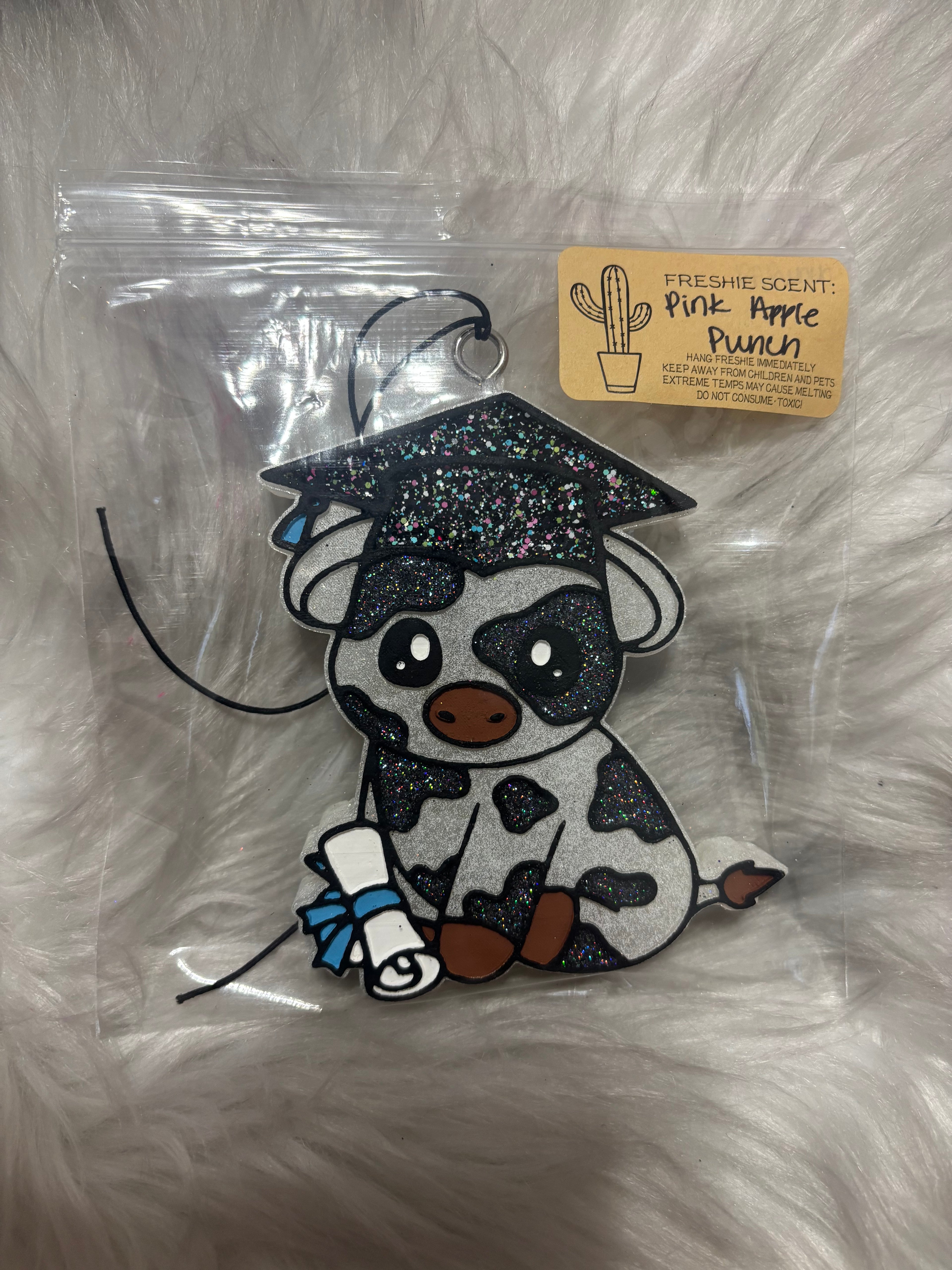 Pink apple punch graduation cow