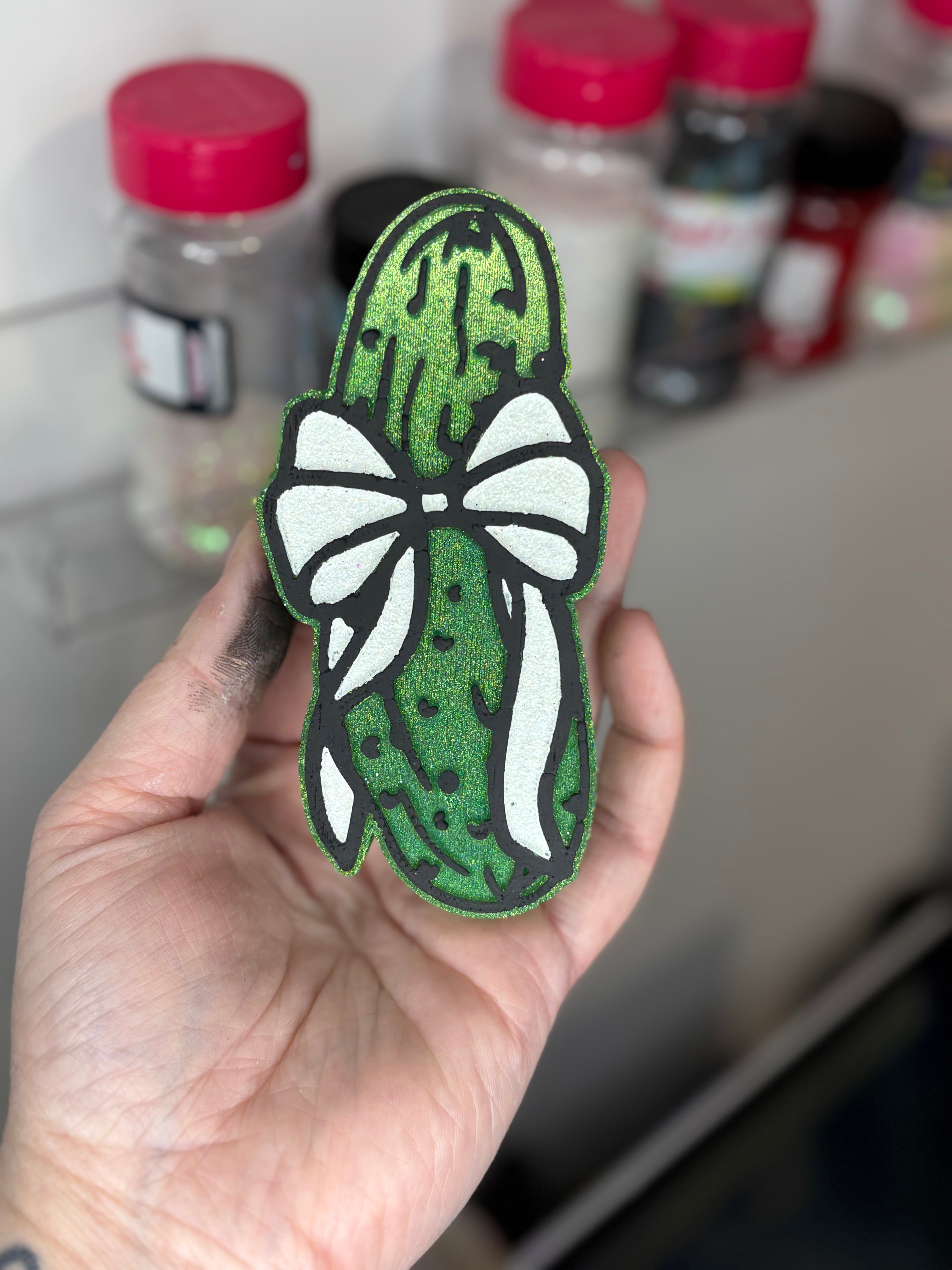 Pickle with bow