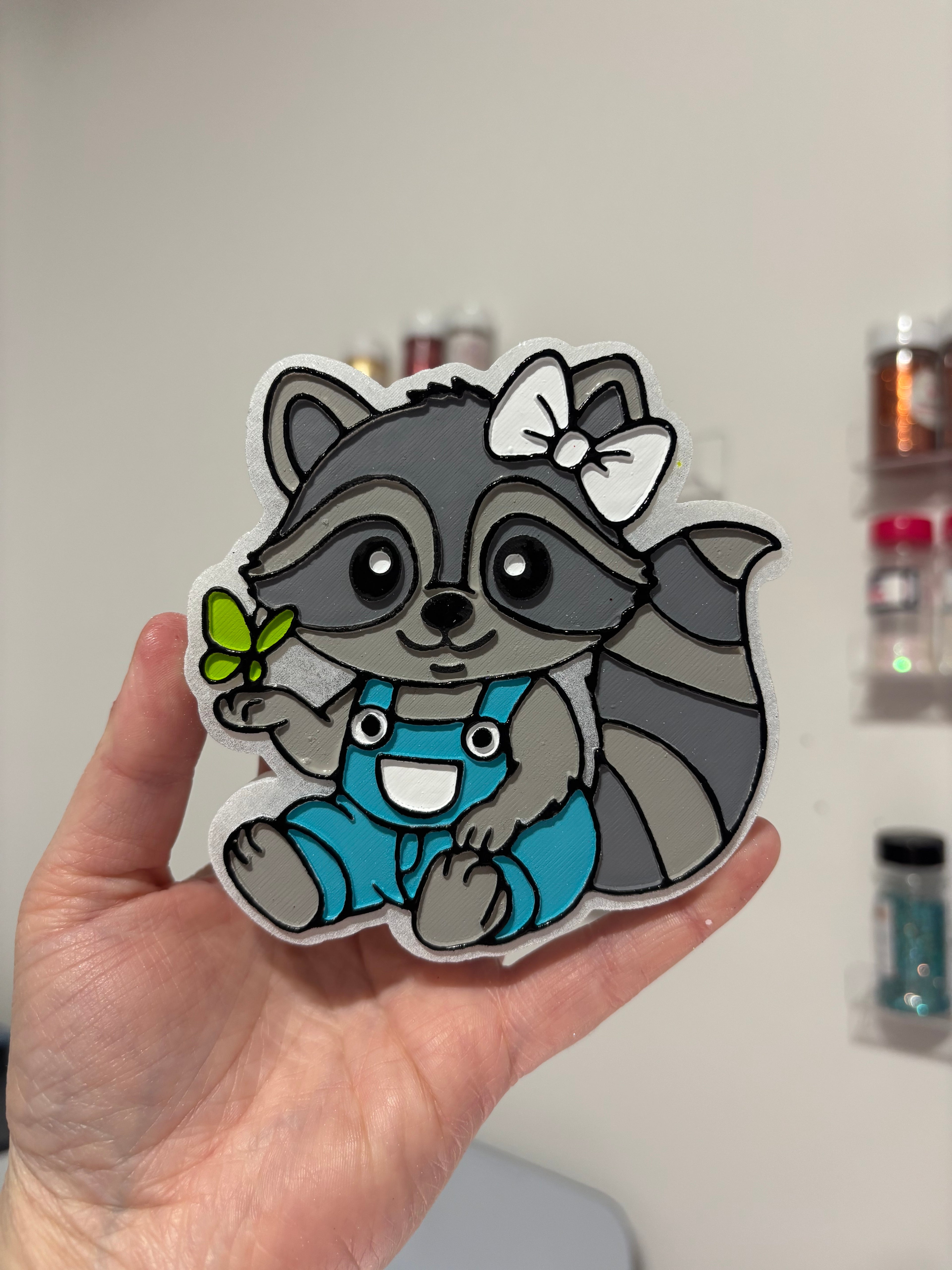 Overall coon with butterfly