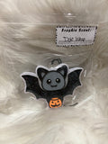 Bat with orange pumpkin dole whip